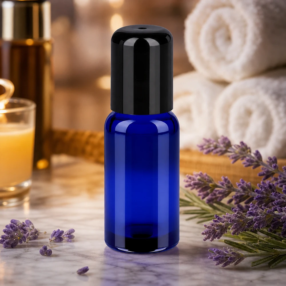 20 ml roll-on flaske sort STD BlueLine UT18/20 20 ml glasflaske med roll-on-applikator i intens blå til aromaterapi og parfumeolier