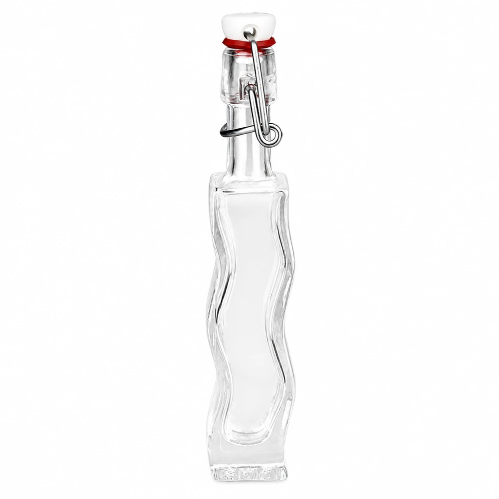 40 ml Glasflaske »Fila« med PVC-skruelåg UNiTWIST® 40 ml glasflaske Anna med gennemsigtigt glas og hvid PVC-svingtop UNiTWIST, buet form