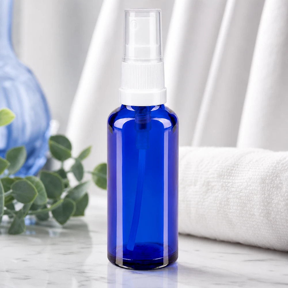 Apotekerflaske blå 10 ml spraytilbehør sort Koboltblåt sprøjteglas af apotekerglas med gennemsigtig hætte på marmor