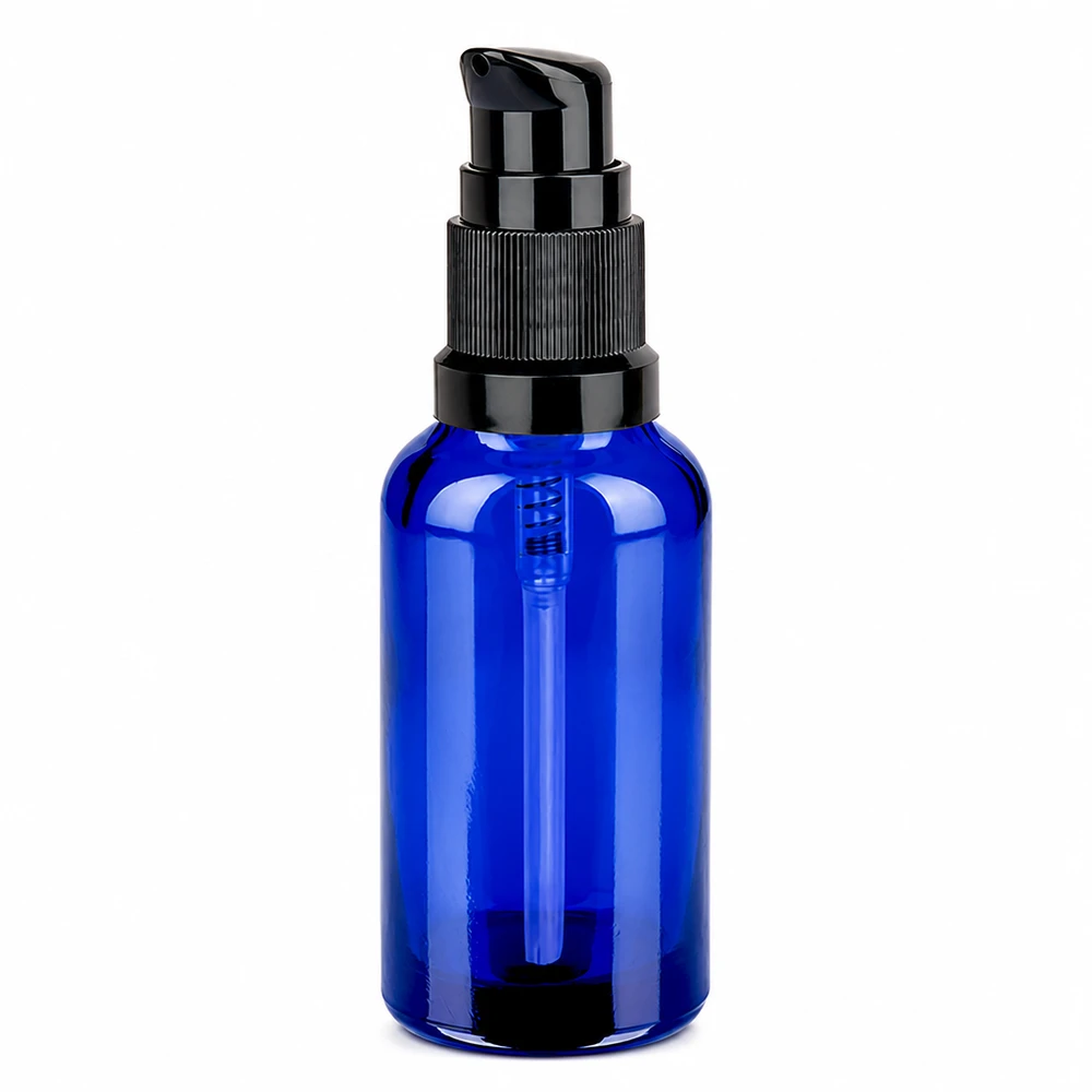 Blå glasflaske 30 ml med sort dispenser til præcis dosering af hudplejeprodukter