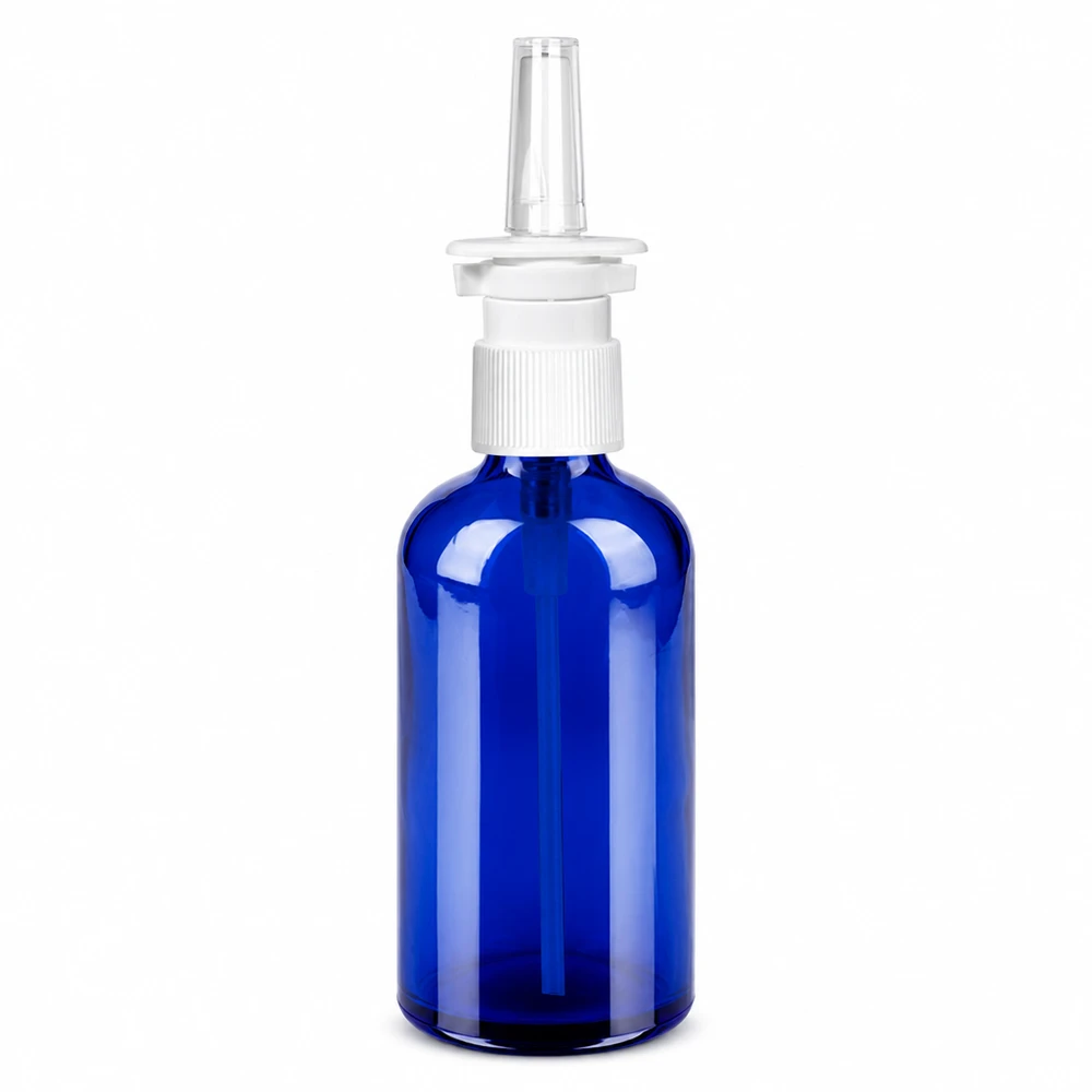 100 ml næsesprayflaske m./tr. STD BlueLine UT18/100 Blå 100 ml næsesprayflaske af glas med hvid spraytilslutning til medicinsk brug