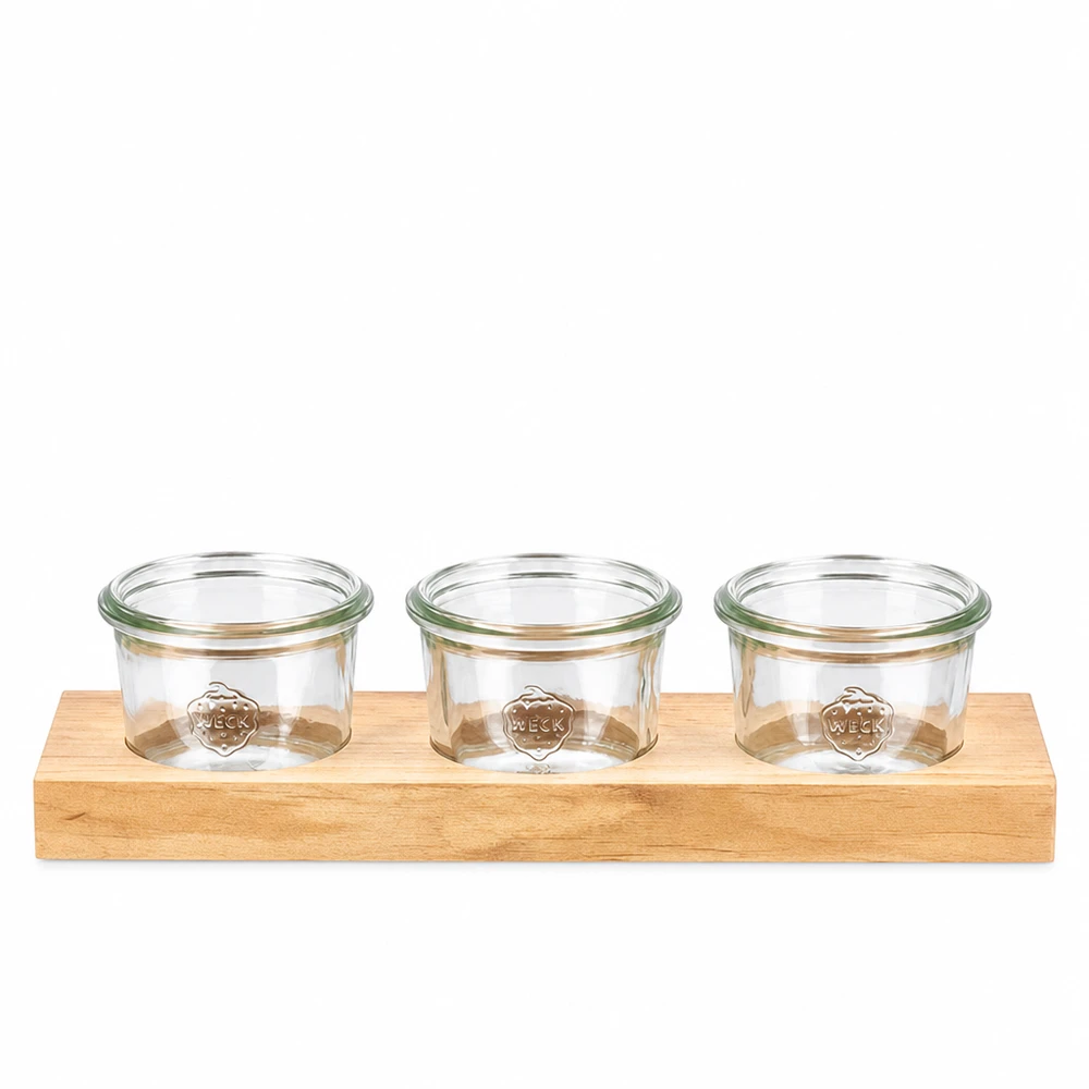 Serveringsbræt Plano3 med 3 Weck-glas med skruelåg, 80 ml Plano3 serveringsbræt i træ med 3 Weck 80 ml-bægre til dip, krydderier og snacks