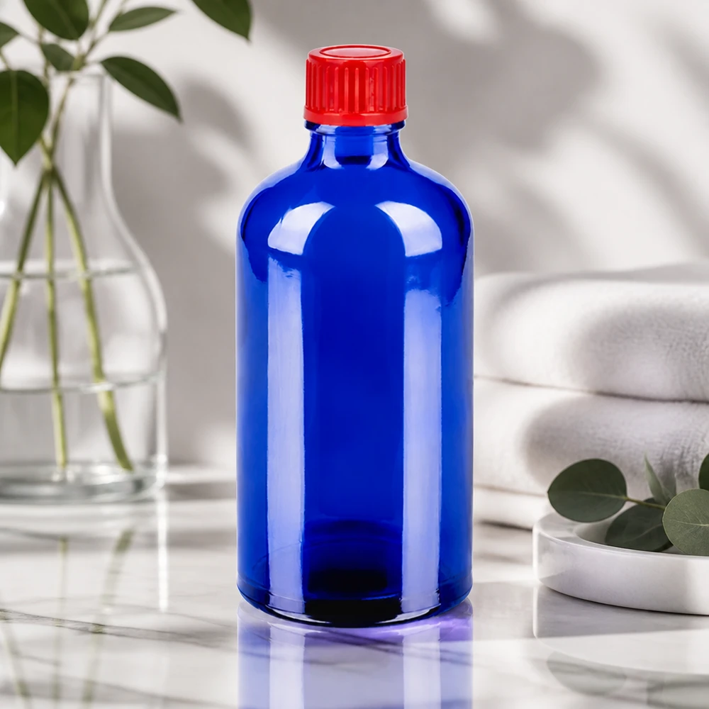 100 ml SV-flaske med ribbet rødt skruelåg og blå glasoverflade STD BlueLine