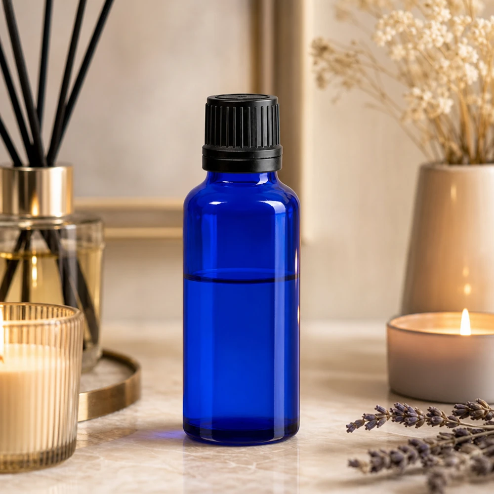 Apoteksflaske blå 30ml dryp v. Pr. 1mm sort OV Aromaterapi-dråbeflaske på 30 ml af koboltblåt sikkerhedsglas med sort OV-låg
